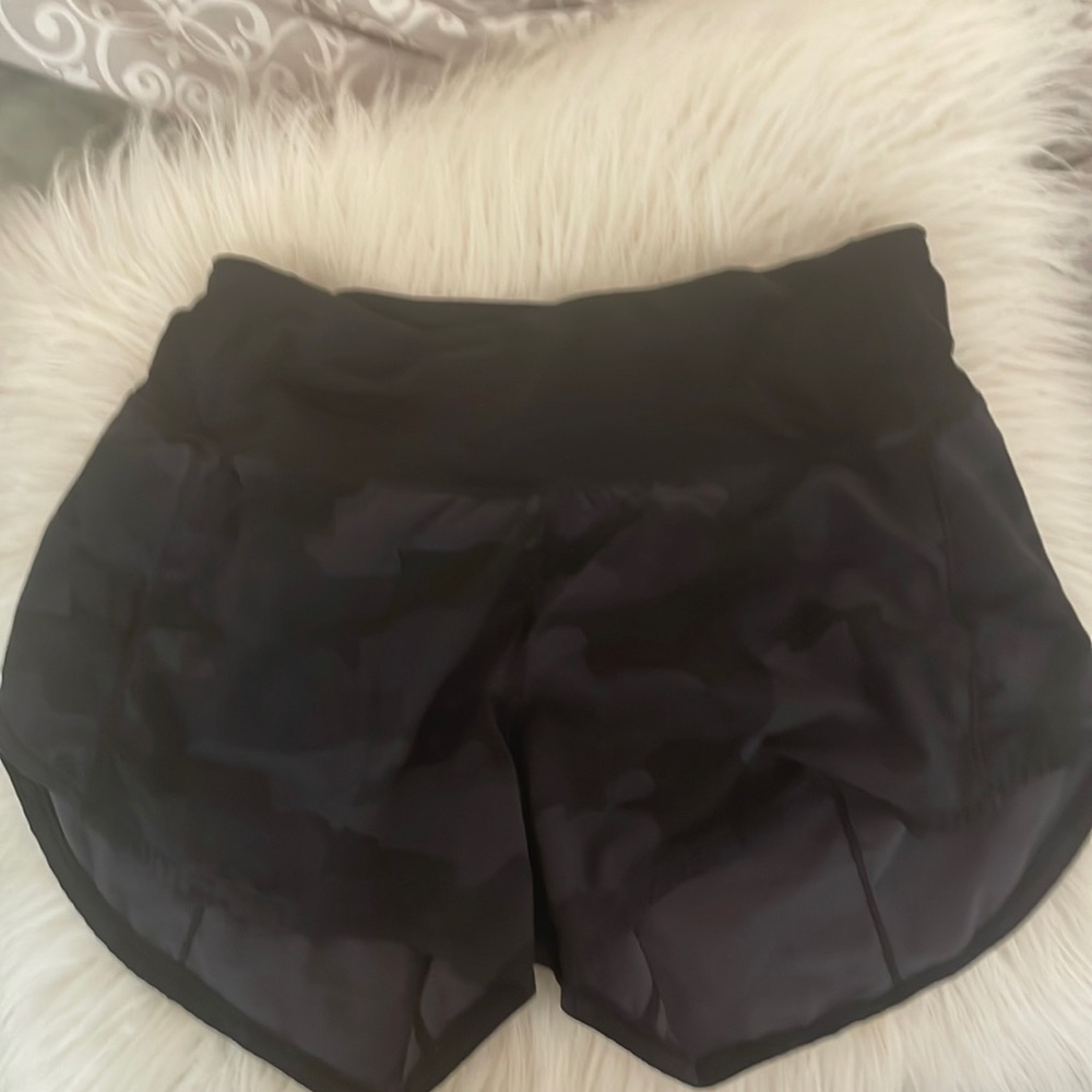 Lululemon size 4 tall camo speed up shorts.